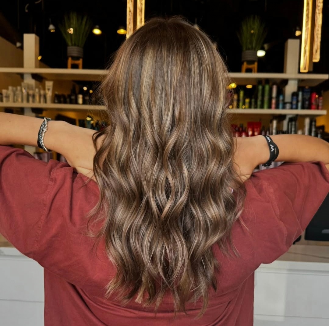 Full highlight and toner, styled in loose waves — hair by Lili Barker in Leander, TX