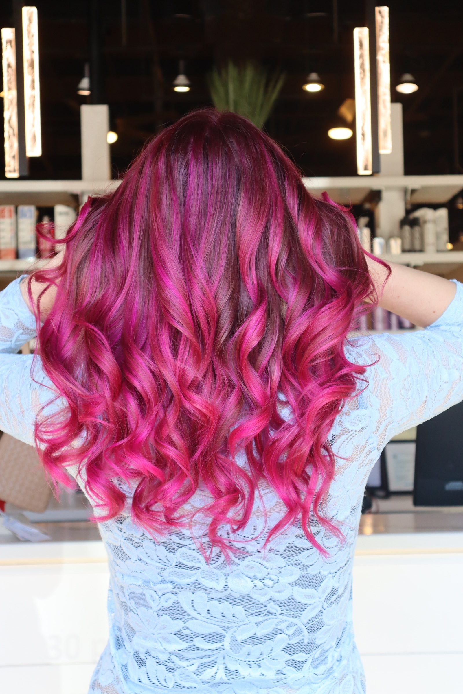 Dimensional blonde highlights finished with a gloss — hair by Lili Barker in Leander, TX