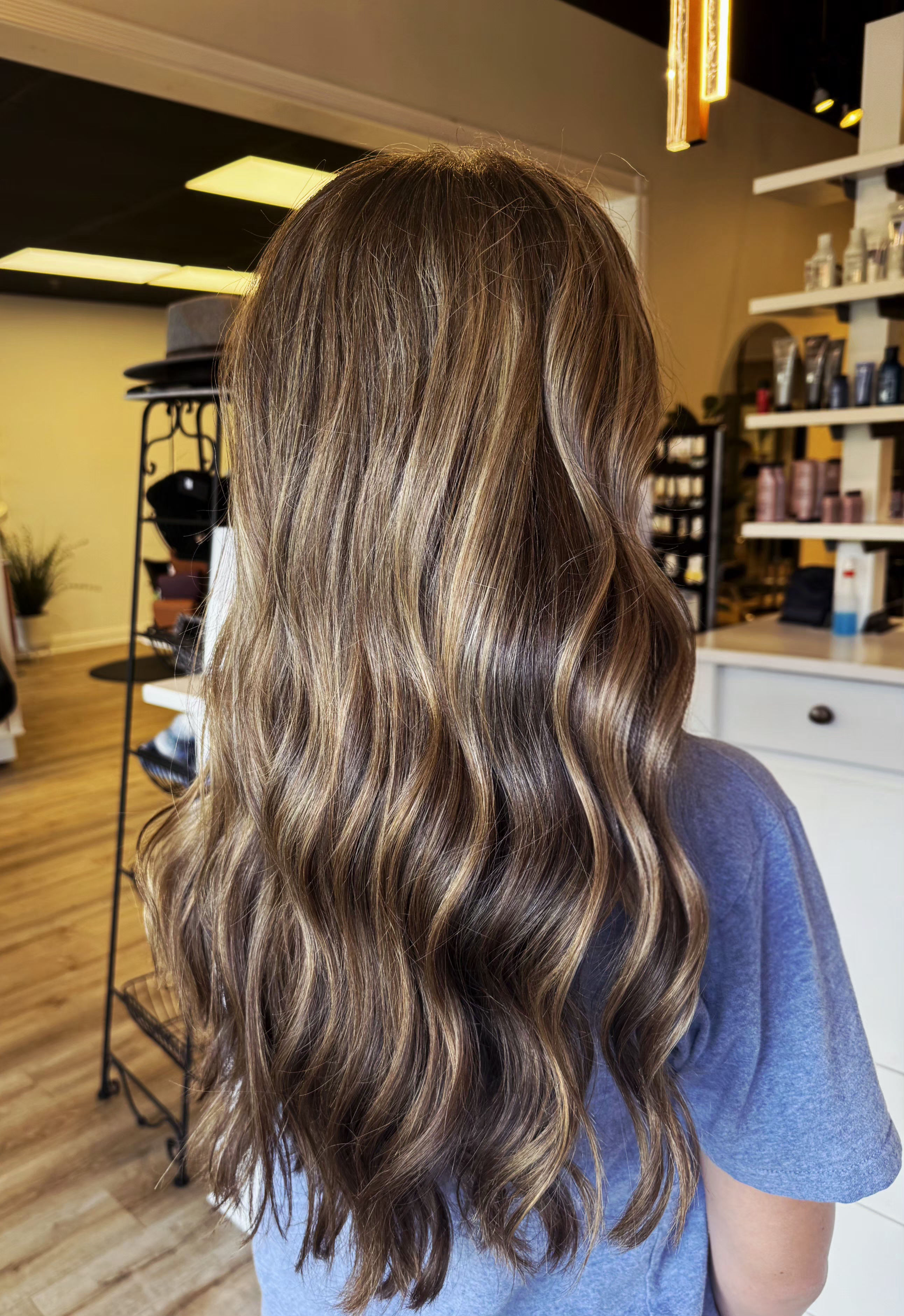 Precision haircut shaped around the client's face — hair by Lili Barker in Leander, TX